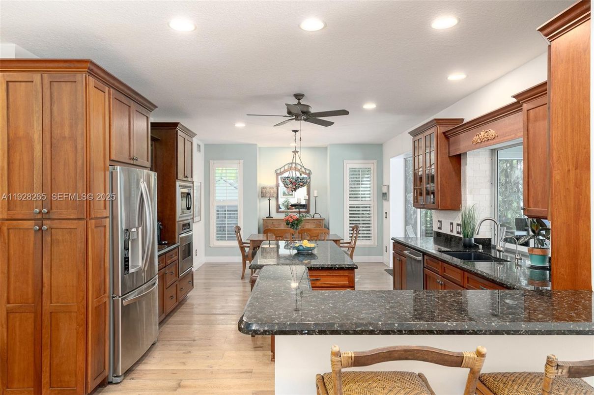 Dining room, Interior, Kitchen, Recessed Lighting, Stainless Steel Appliances, Wood Texture Flooring