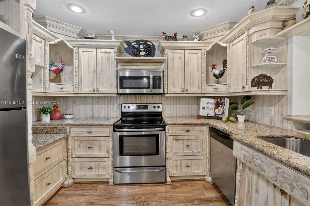 Interior, Kitchen, Recessed Lighting, Stainless Steel Appliances, Wood Texture Flooring