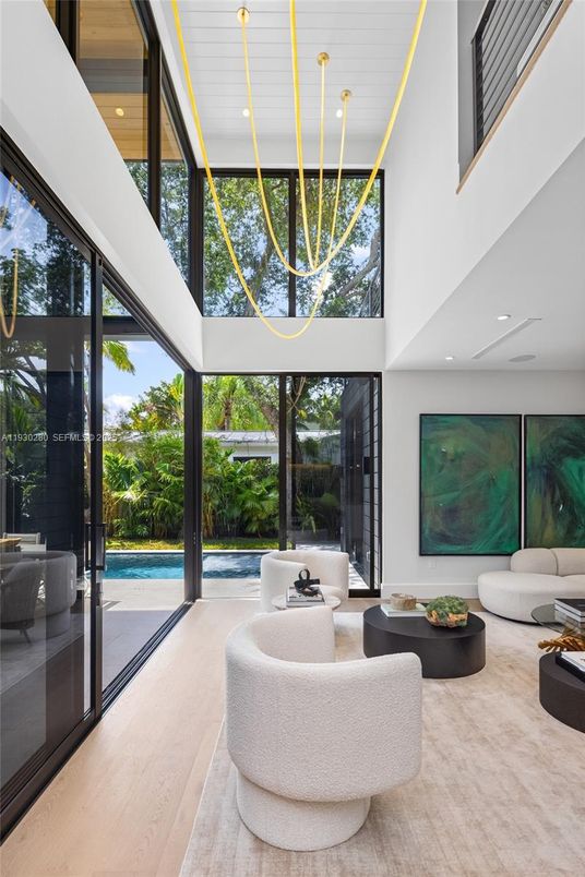 Interior, Living room, Pendant Lights, Recessed Lighting, Sun Room, Wood Texture Flooring
