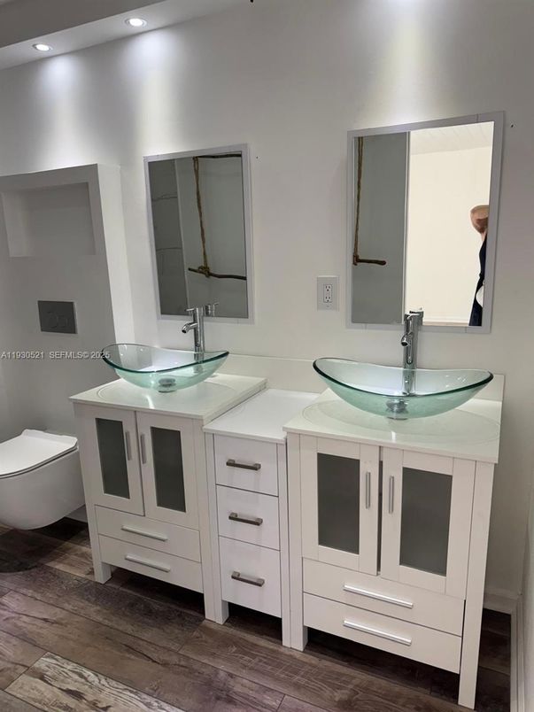 Bathroom, Dual Sink Vanities, Interior, Recessed Lighting, Wood Texture Flooring