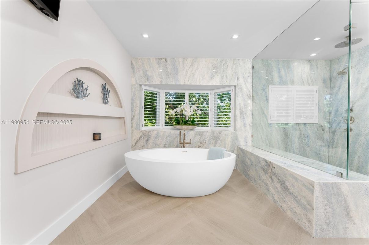 Bathroom, Free Standing Baths, Glass Shower, Interior, Marble Walls, Recessed Lighting, Wood Texture Flooring