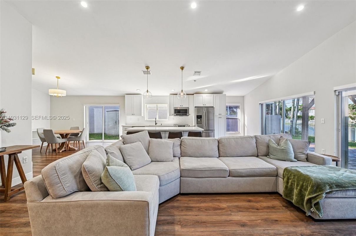 Dining room, Interior, Kitchen, Living room, Pendant Lights, Recessed Lighting, Stainless Steel Appliances, Wood Texture Flooring