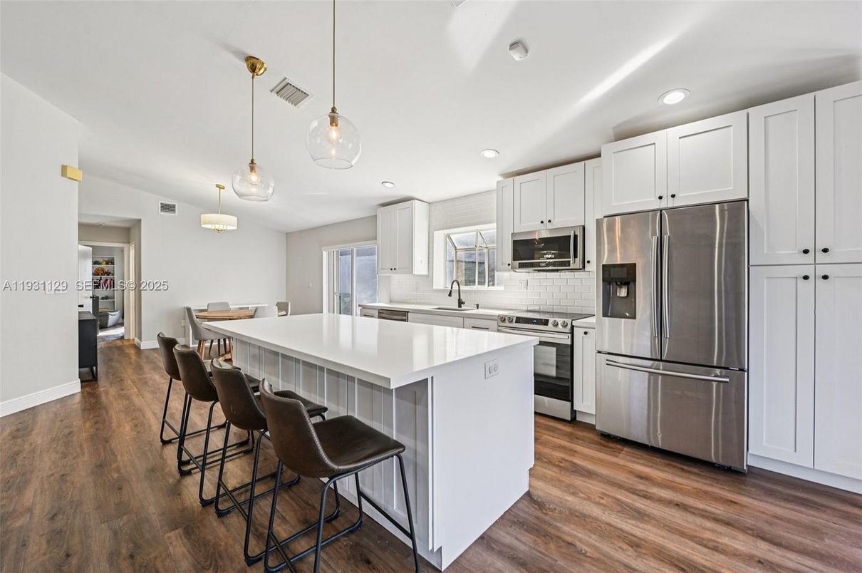 Interior, Kitchen, Pendant Lights, Recessed Lighting, Stainless Steel Appliances, Wood Texture Flooring
