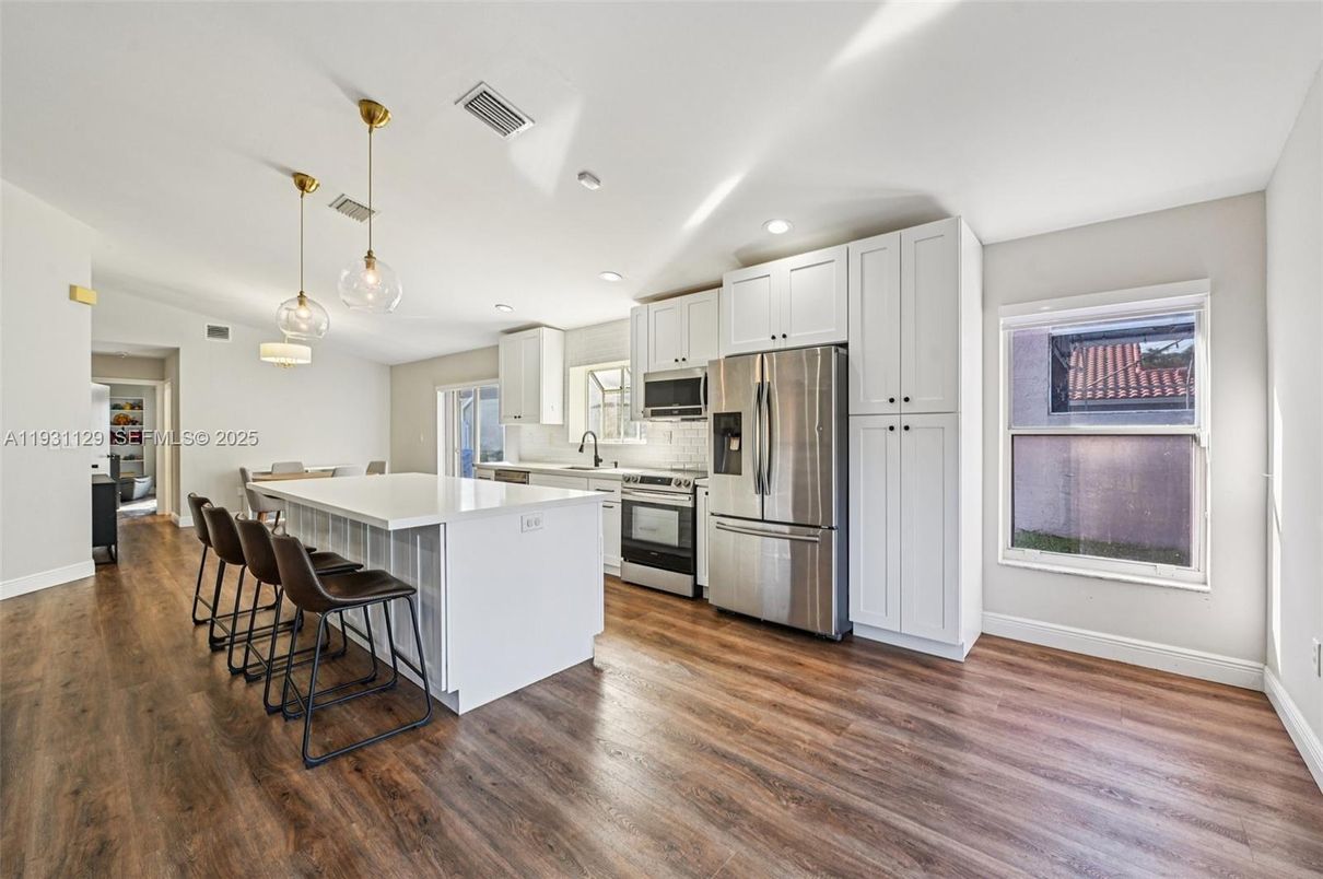 Interior, Kitchen, Pendant Lights, Recessed Lighting, Stainless Steel Appliances, Wood Texture Flooring
