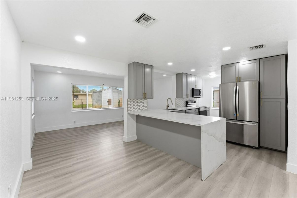 Interior, Kitchen, Recessed Lighting, Stainless Steel Appliances, Wood Texture Flooring