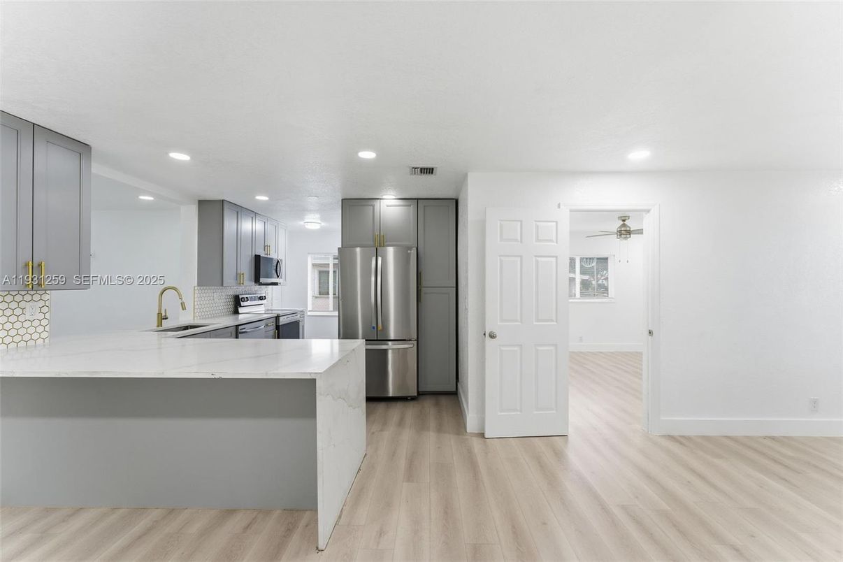 Interior, Kitchen, Recessed Lighting, Stainless Steel Appliances, Wood Texture Flooring