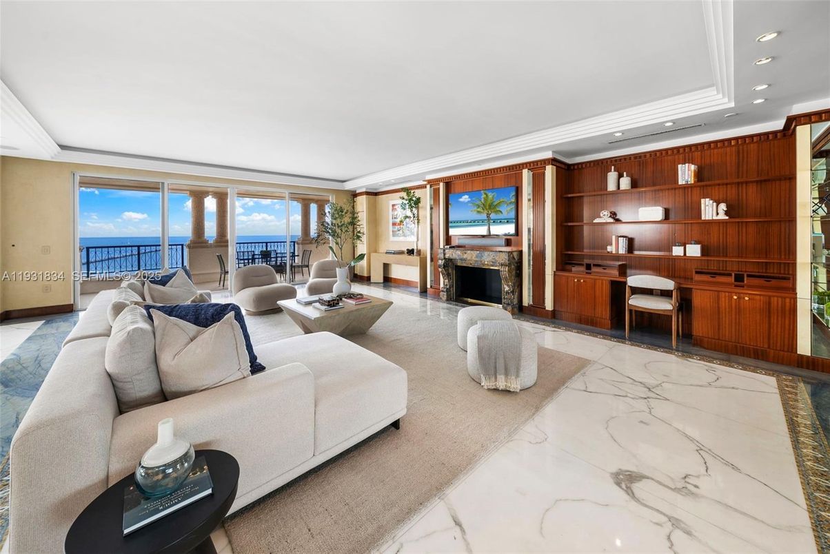 Fireplace, Interior, Living room, Marble, Recessed Lighting, Water, Wooden Walls