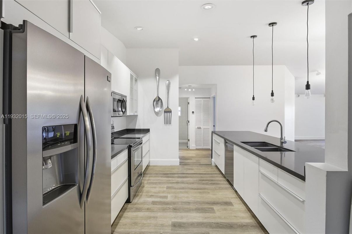 Interior, Kitchen, Pendant Lights, Recessed Lighting, Stainless Steel Appliances, Wood Texture Flooring