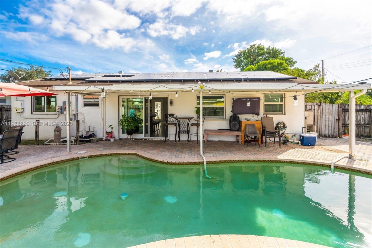 Exterior, Pool, Solar Panels