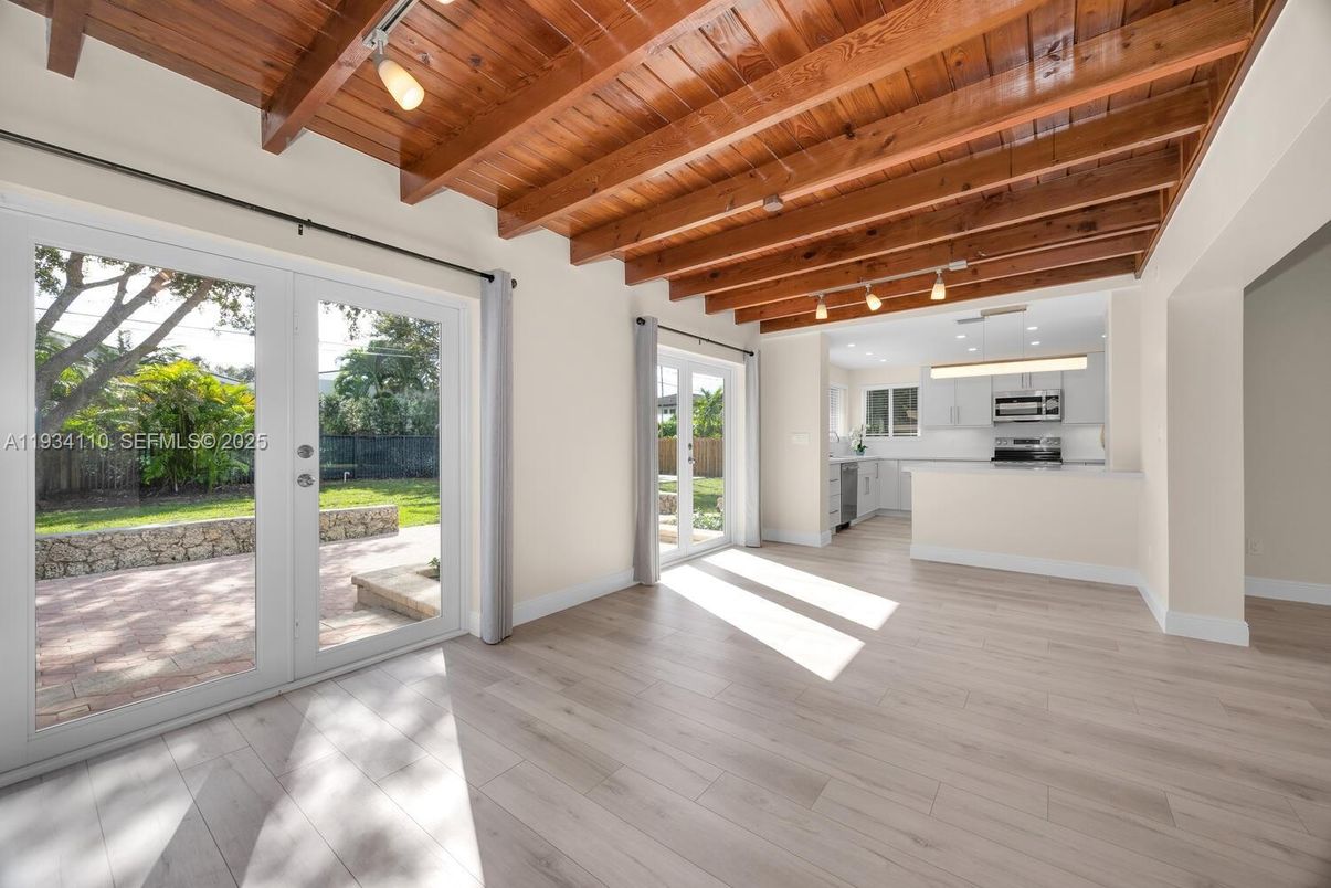 Empty room, Interior, Kitchen, Pendant Lights, Stainless Steel Appliances, Wooden Beams, Wooden Ceilings, Wood Texture Flooring