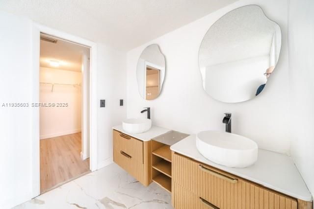 Bathroom, Dual Sink Vanities, Interior, Marble, Walk-in Closets, Wood Texture Flooring