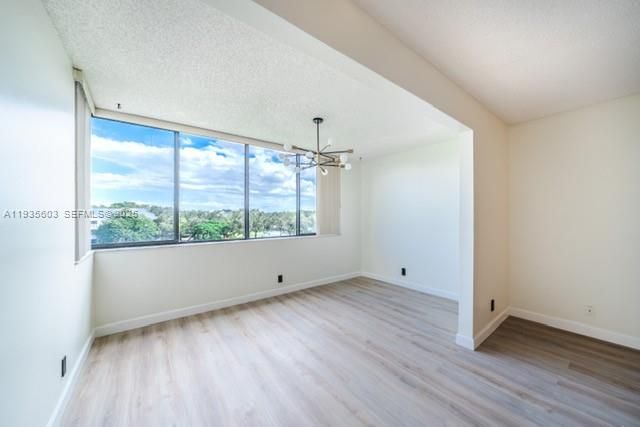 Empty room, Interior, Pendant Lights, Wood Texture Flooring