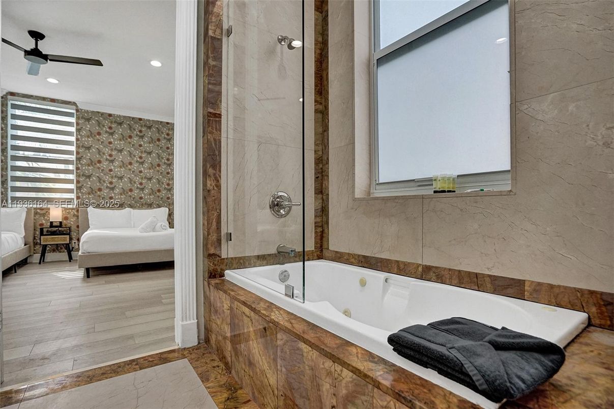 Bathroom, Bedroom, Glass Shower, Interior, Marble Walls, Recessed Lighting, Wood Texture Flooring