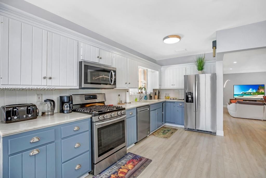 Interior, Kitchen, Recessed Lighting, Stainless Steel Appliances, Wood Texture Flooring