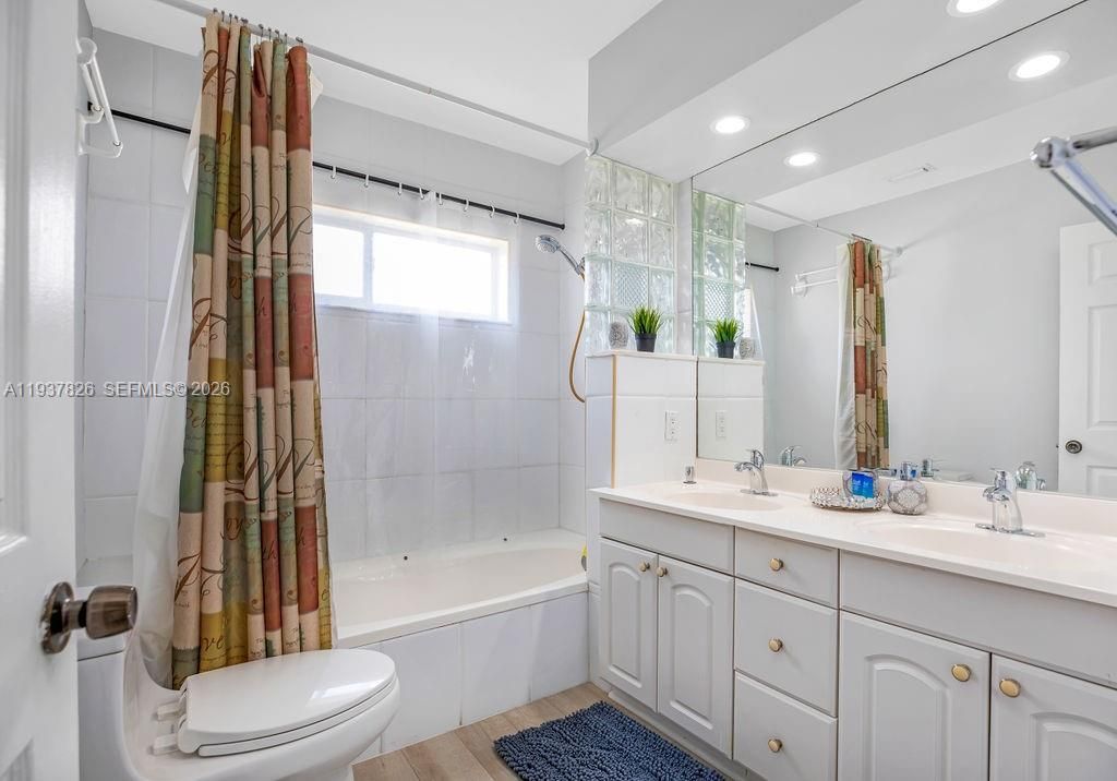 Bathroom, Dual Sink Vanities, Interior, Recessed Lighting, Wood Texture Flooring