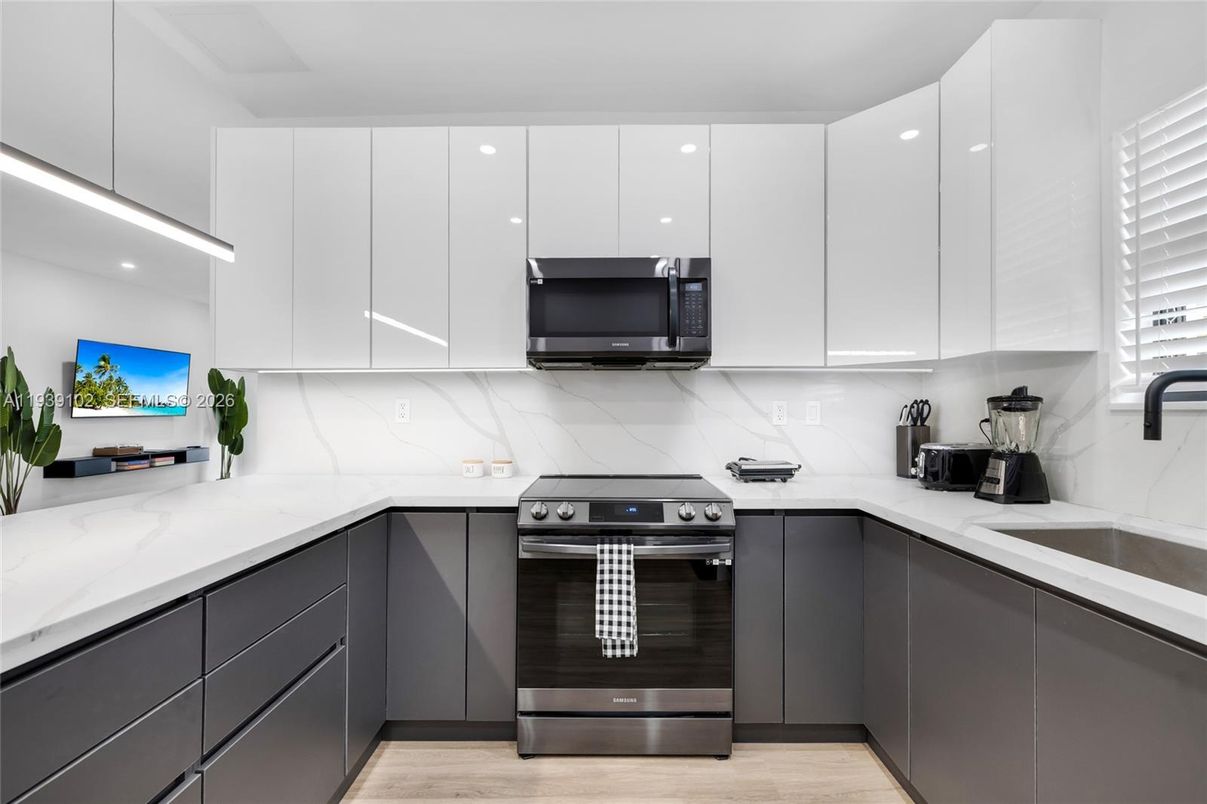 Interior, Kitchen, Marble Walls, Stainless Steel Appliances, Wood Texture Flooring