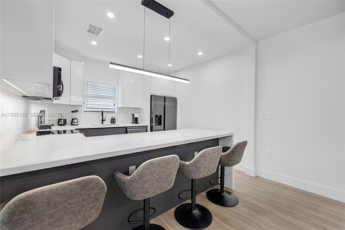 Interior, Kitchen, Pendant Lights, Recessed Lighting, Stainless Steel Appliances, Wood Texture Flooring