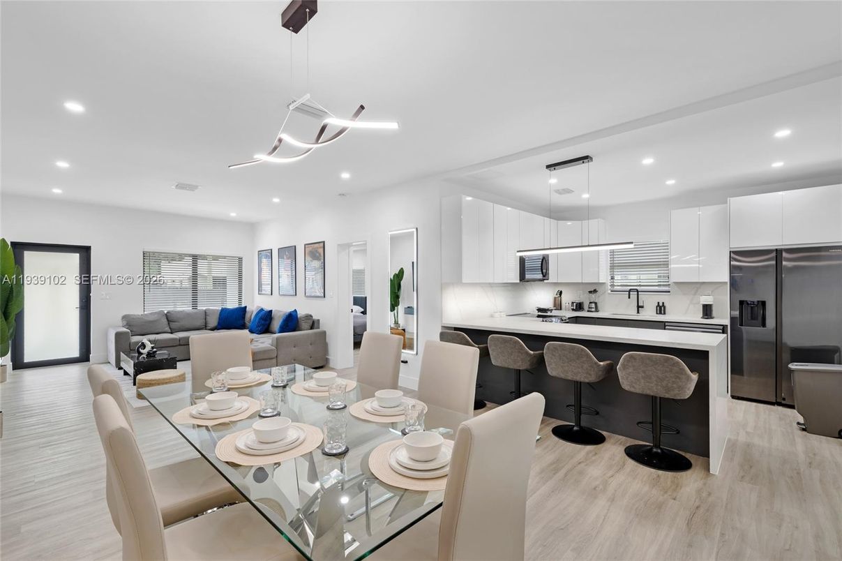 Dining room, Interior, Kitchen, Living room, Pendant Lights, Recessed Lighting, Stainless Steel Appliances, Wood Texture Flooring