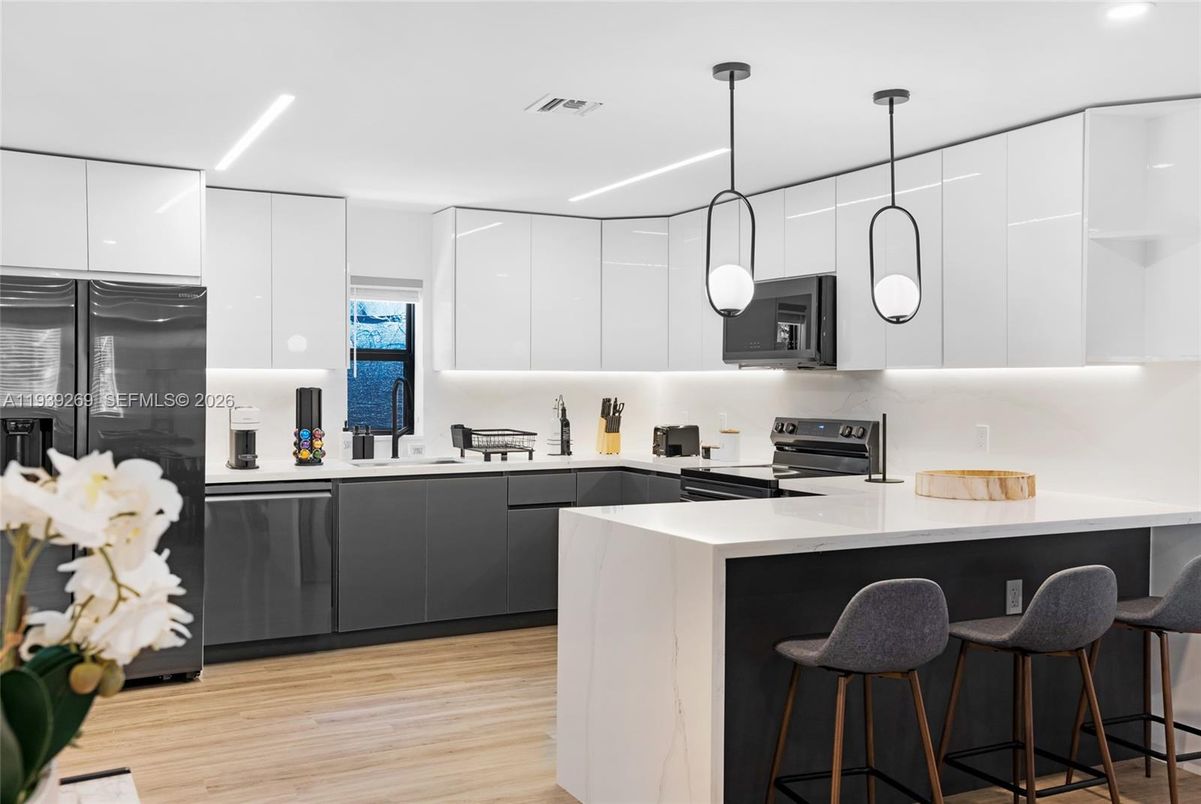 Interior, Kitchen, Pendant Lights, Recessed Lighting, Stainless Steel Appliances, Wood Texture Flooring