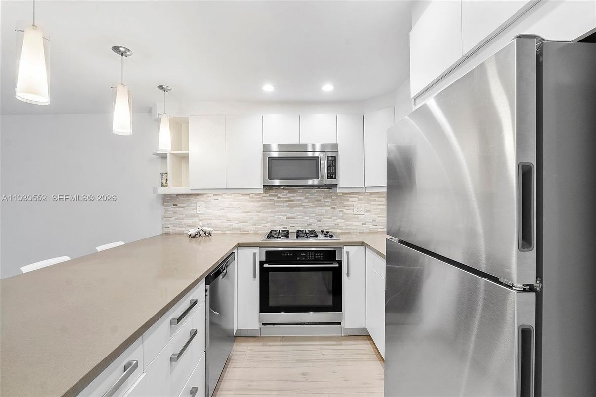 Interior, Kitchen, Pendant Lights, Recessed Lighting, Stainless Steel Appliances, Wood Texture Flooring