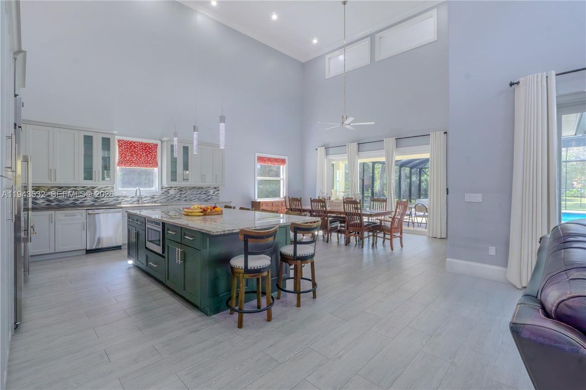 Dining room, Interior, Kitchen, Pendant Lights, Recessed Lighting, Stainless Steel Appliances, Wood Texture Flooring