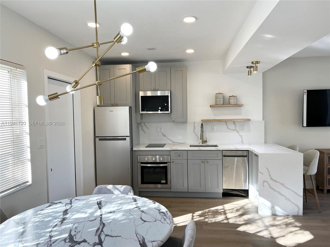 Interior, Kitchen, Pendant Lights, Recessed Lighting, Stainless Steel Appliances, Wood Texture Flooring