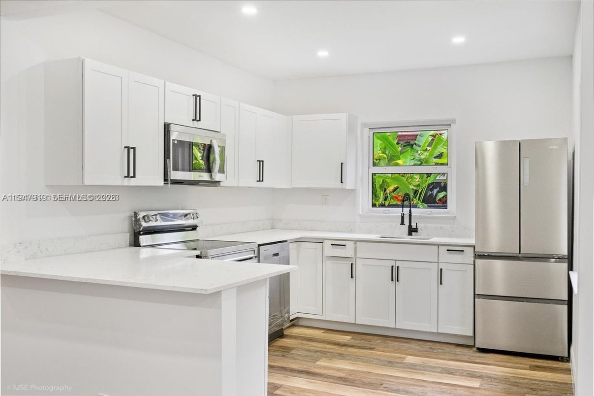 Interior, Kitchen, Recessed Lighting, Stainless Steel Appliances, Wood Texture Flooring