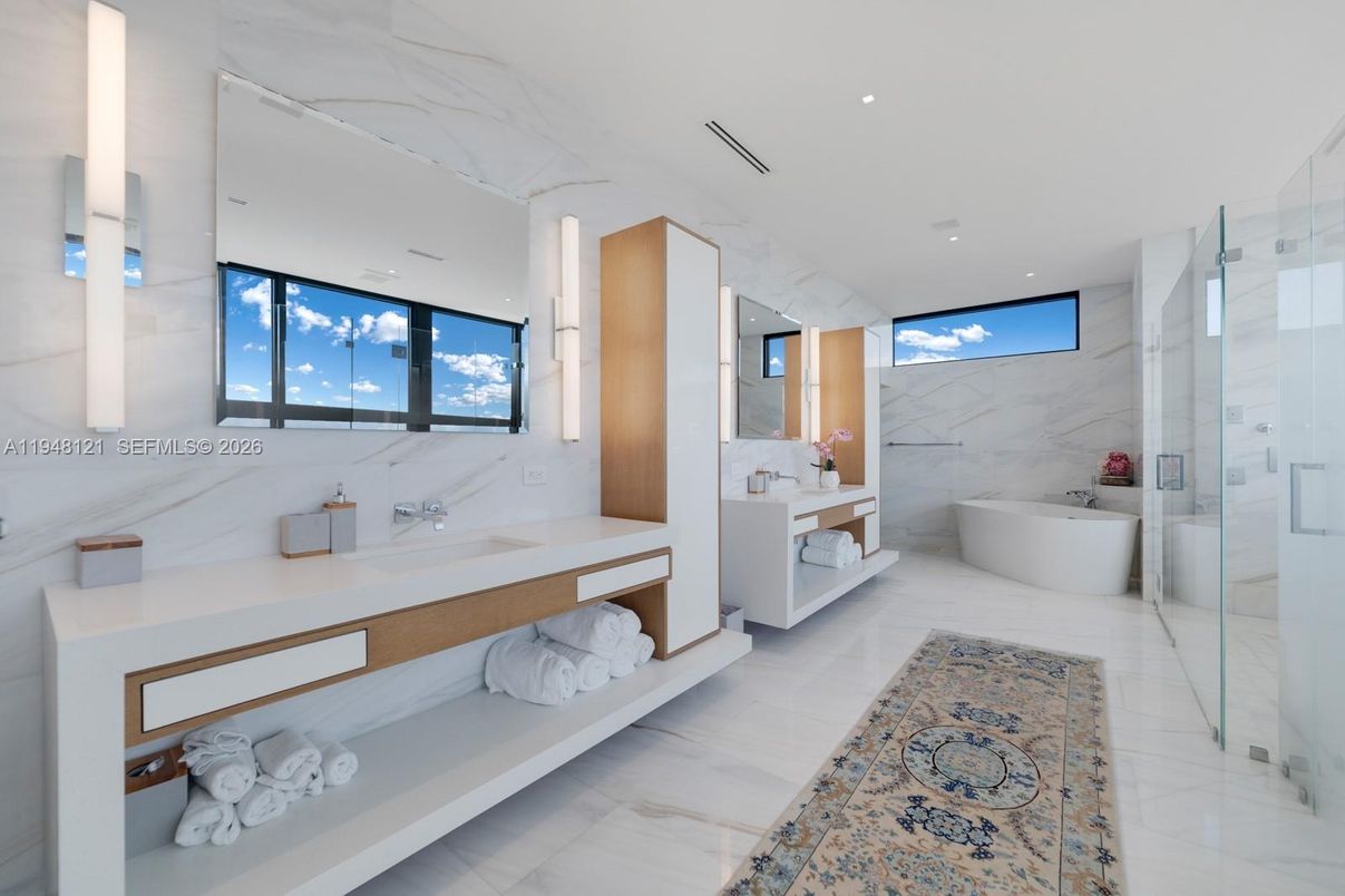 Bathroom, Dual Sink Vanities, Free Standing Baths, Glass Shower, Interior, Marble, Marble Walls, Recessed Lighting