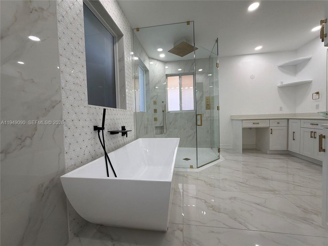 Bathroom, Free Standing Baths, Glass Shower, Interior, Marble, Marble Walls, Recessed Lighting