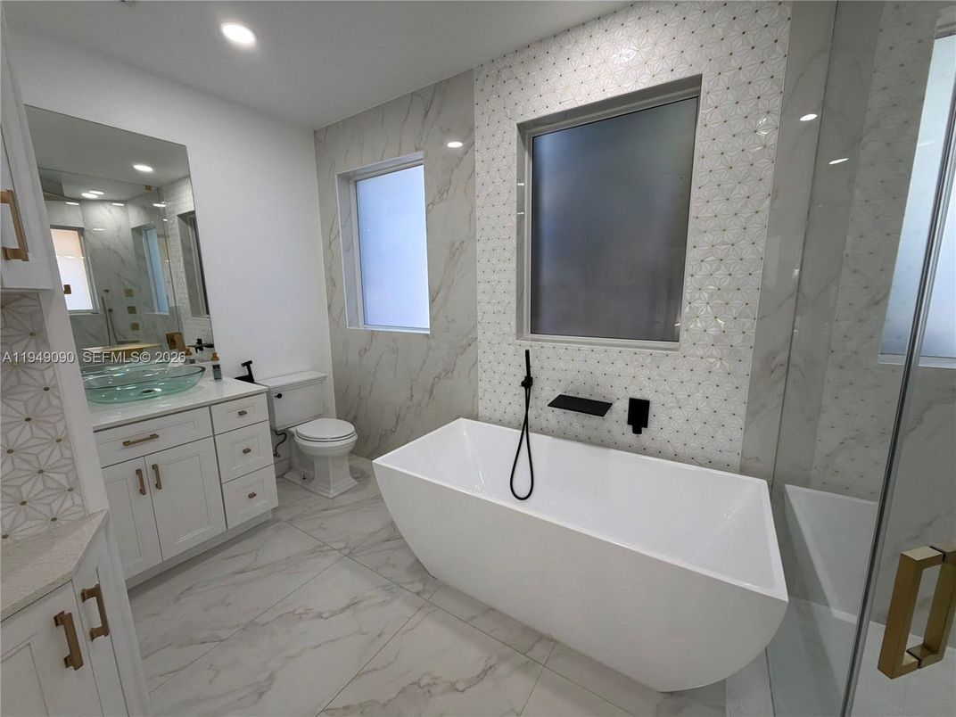 Bathroom, Free Standing Baths, Interior, Marble, Marble Walls, Recessed Lighting