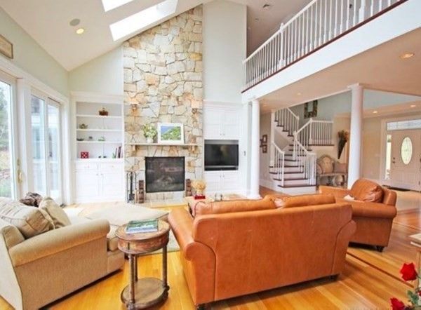 Fireplace, Interior, Living room, Recessed Lighting, Stone Walls, Wood Texture Flooring