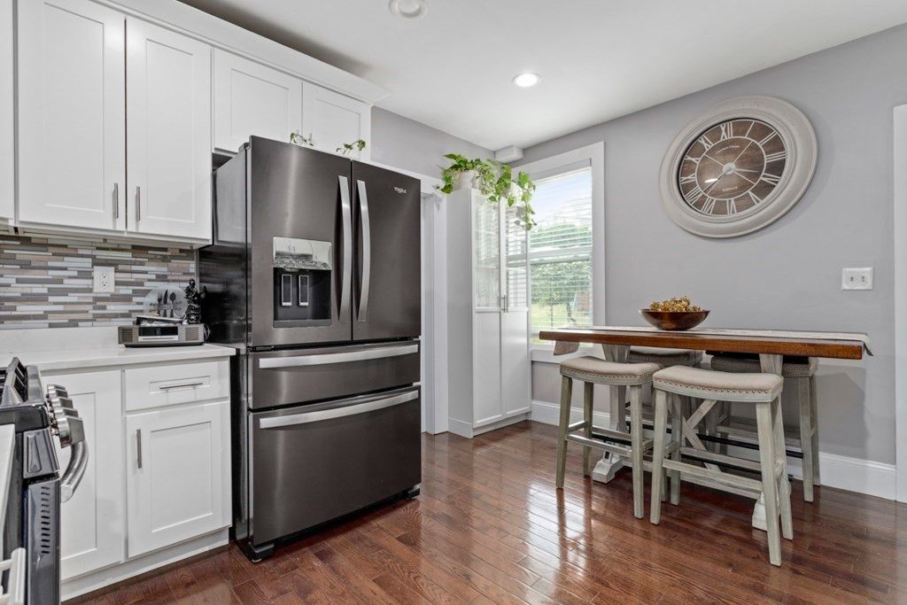 Dining room, Interior, Kitchen, Recessed Lighting, Stainless Steel Appliances, Wood Texture Flooring