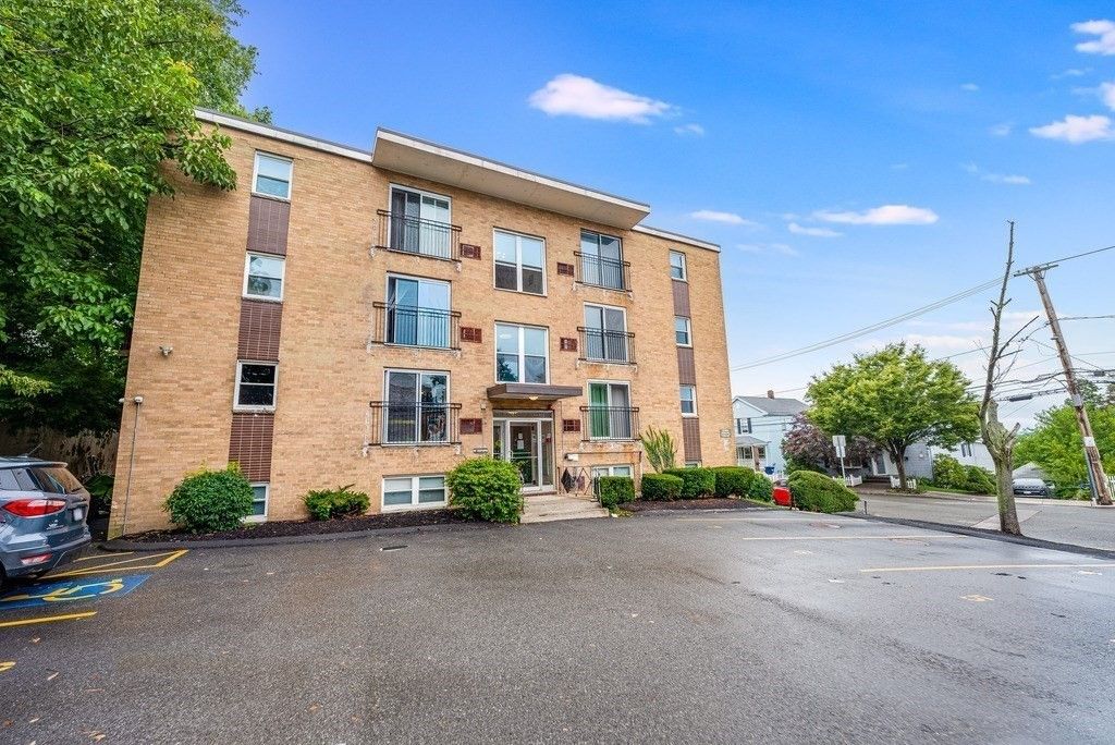 Exterior, Facade, Brick Facade, Condo Building