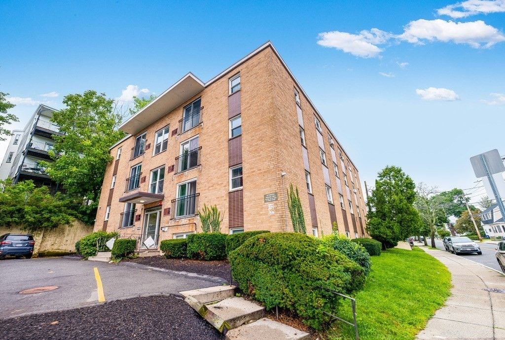 Exterior, Facade, Brick Facade, Condo Building