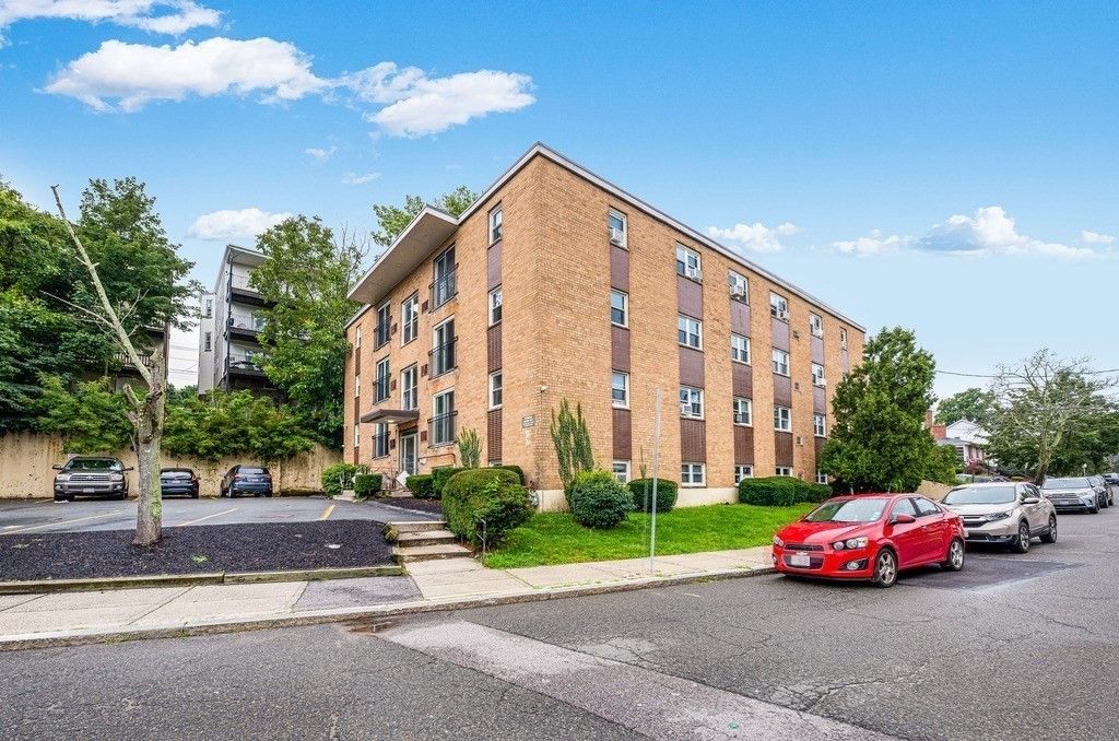 Exterior, Facade, Brick Facade, Condo Building