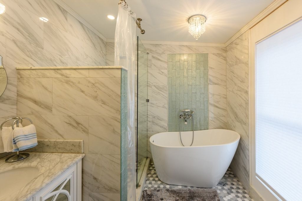 Bathroom, Free Standing Baths, Glass Shower, Interior, Marble Walls, Recessed Lighting