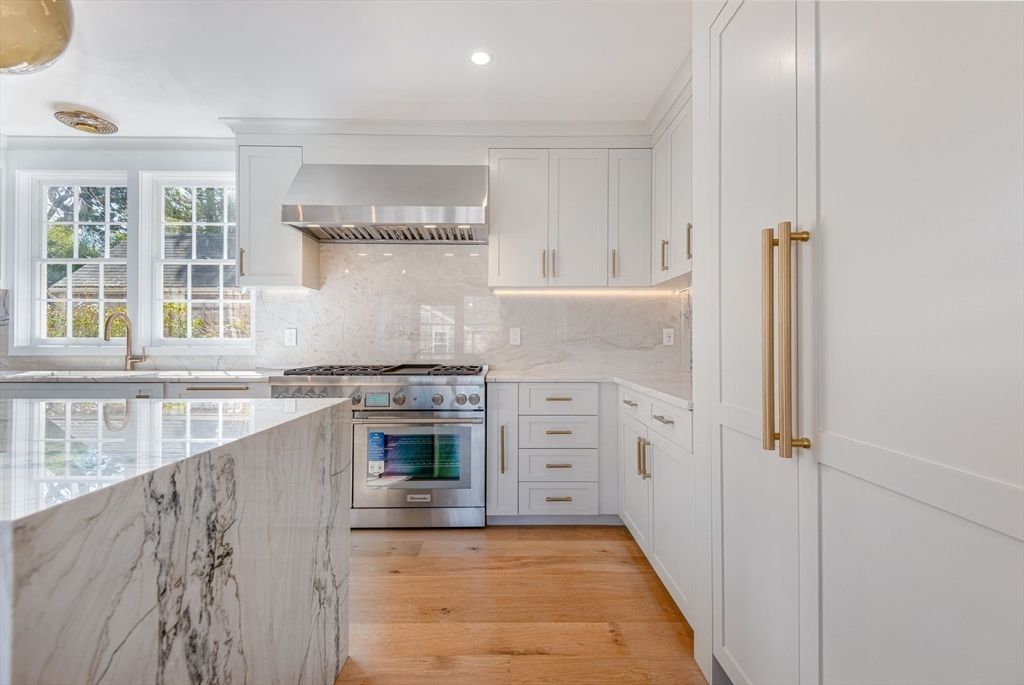 Interior, Kitchen, Marble Walls, Recessed Lighting, Stainless Steel Appliances, Wood Texture Flooring