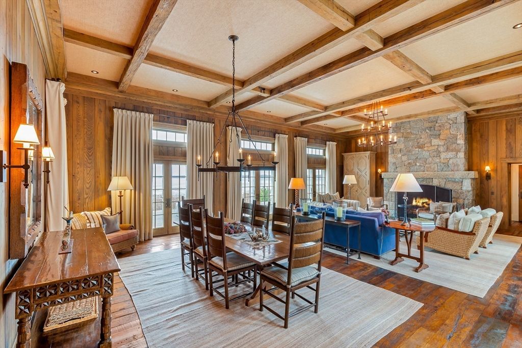 Chandelier, Dining room, Fireplace, Interior, Living room, Pendant Lights, Recessed Lighting, Stone Walls, Wooden Beams, Wood Texture Flooring, Wooden Walls