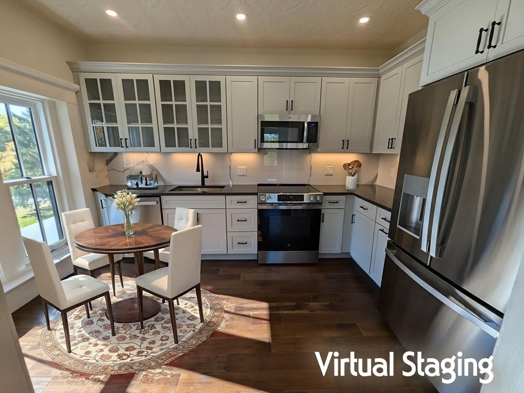 Dining room, Interior, Kitchen, Recessed Lighting, Stainless Steel Appliances, Wood Texture Flooring