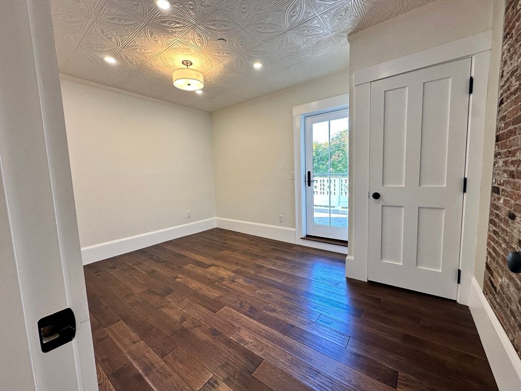 Empty room, Interior, Recessed Lighting, Stone Walls, Wood Texture Flooring