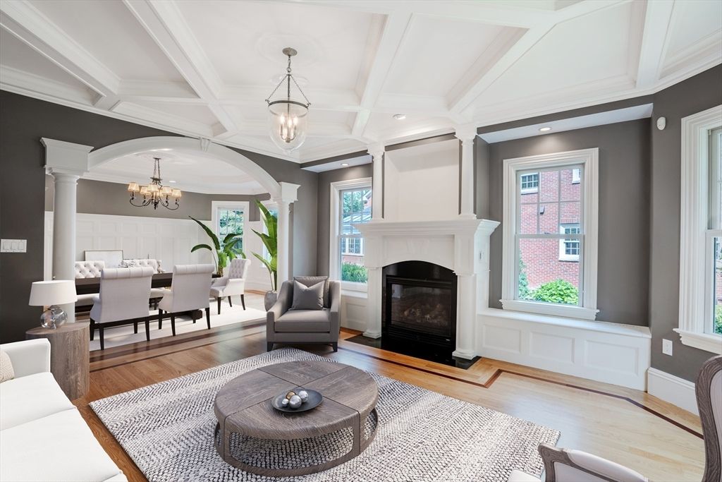 Chandelier, Dining room, Fireplace, Interior, Living room, Pendant Lights, Recessed Lighting, Wood Texture Flooring