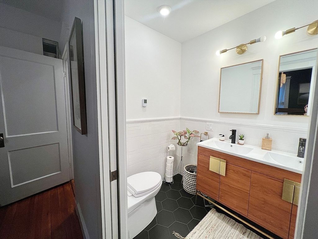 Bathroom, Dual Sink Vanities, Interior, Recessed Lighting, Wood Texture Flooring