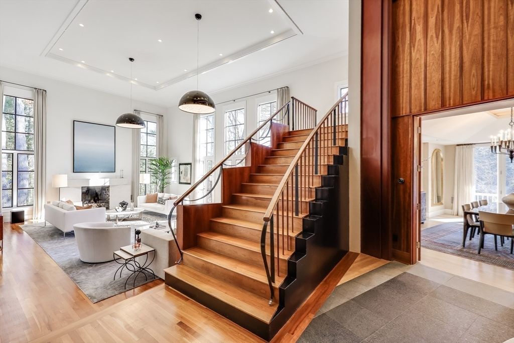 Chandelier, Dining room, Fireplace, Interior, Living room, Pendant Lights, Recessed Lighting, Wood Texture Flooring