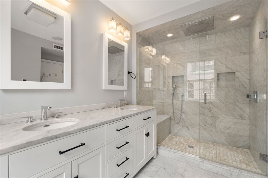 Bathroom, Dual Sink Vanities, Glass Shower, Interior, Marble, Marble Walls, Recessed Lighting
