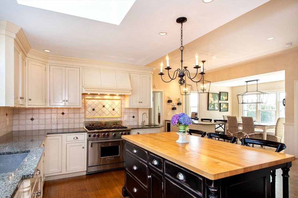 Chandelier, Dining room, Interior, Kitchen, Recessed Lighting, Stainless Steel Appliances, Wood Texture Flooring