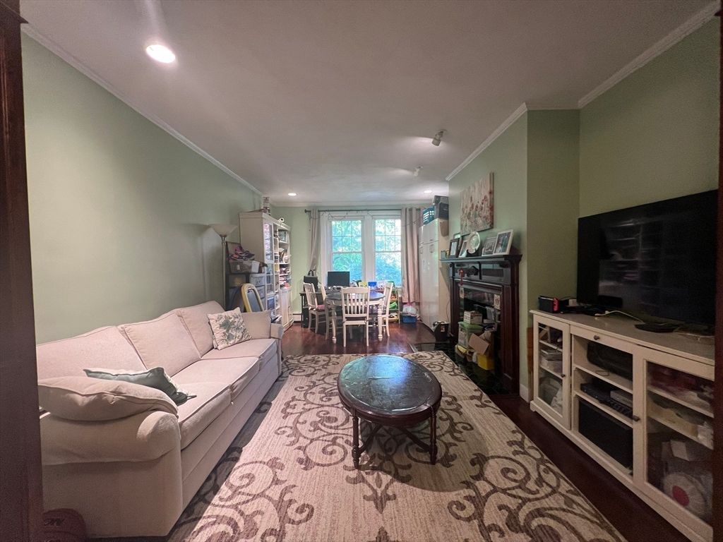 Dining room, Fireplace, Interior, Living room, Recessed Lighting, Water, Wood Texture Flooring