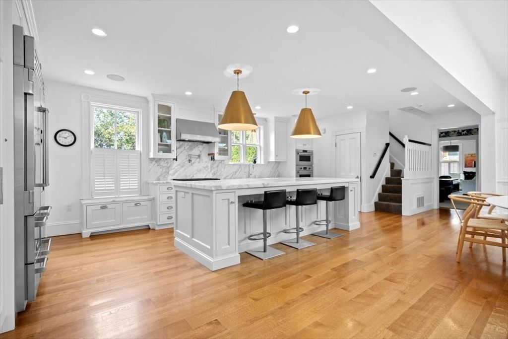 Interior, Kitchen, Marble Walls, Pendant Lights, Recessed Lighting, Stainless Steel Appliances, Wood Texture Flooring