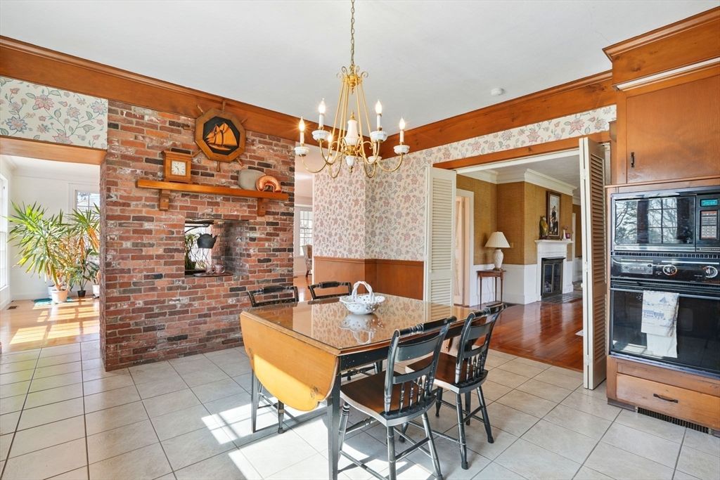Chandelier, Dining room, Fireplace, Interior, Stone Walls, Wood Texture Flooring