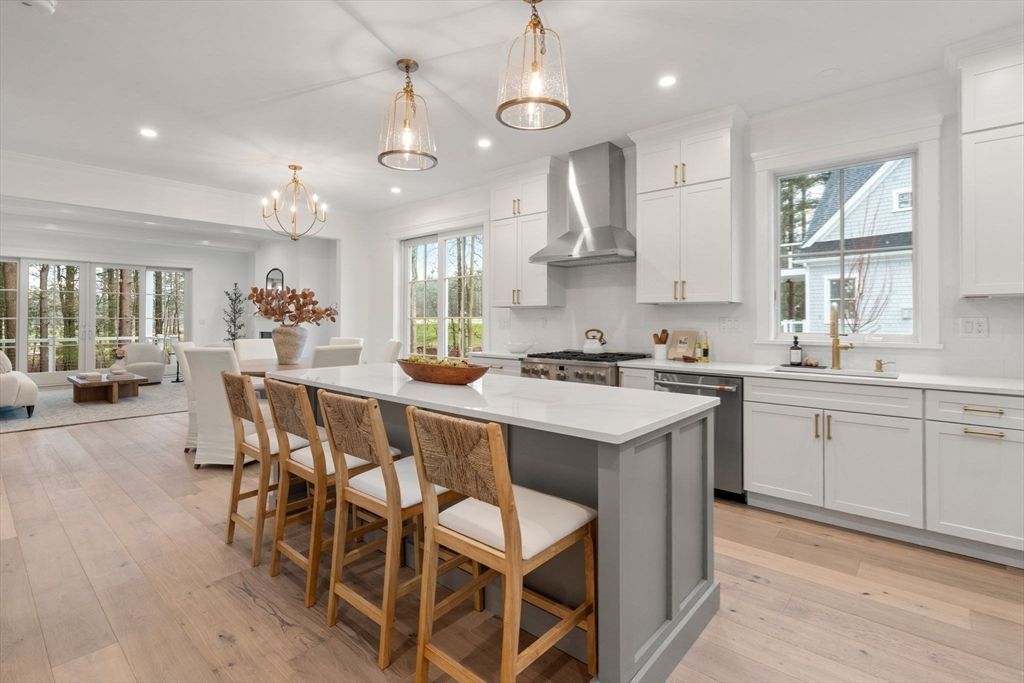Chandelier, Dining room, Interior, Kitchen, Pendant Lights, Recessed Lighting, Stainless Steel Appliances, Wood Texture Flooring