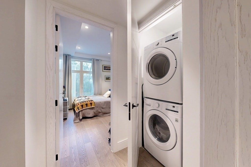 Bedroom, Interior, Recessed Lighting, Utility Closets, Washer, Wood Texture Flooring